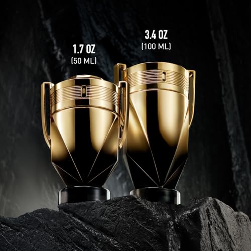 Rabanne Invictus Elixir Parfum for Men - Long Lasting Ambery Aromatic Cologne with Salted Mineral Accord, Aromatic Cypress & Vanilla Caviar - Golden Trophy Bottle French Fragrance Spray, 1.7 oz